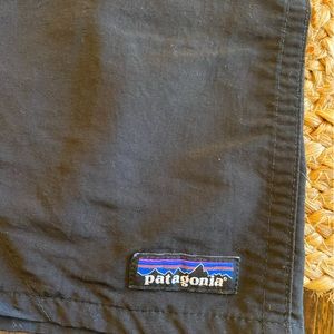 Patagonia- size small black shorts.  Tags and mesh on the inside are cut out.